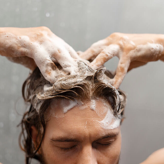 man-giving-himself-scalp-massage